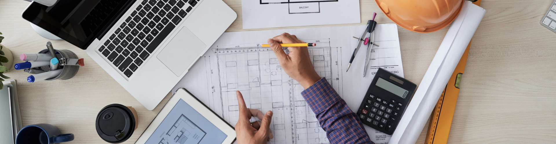 A person writing on a piece of paper.