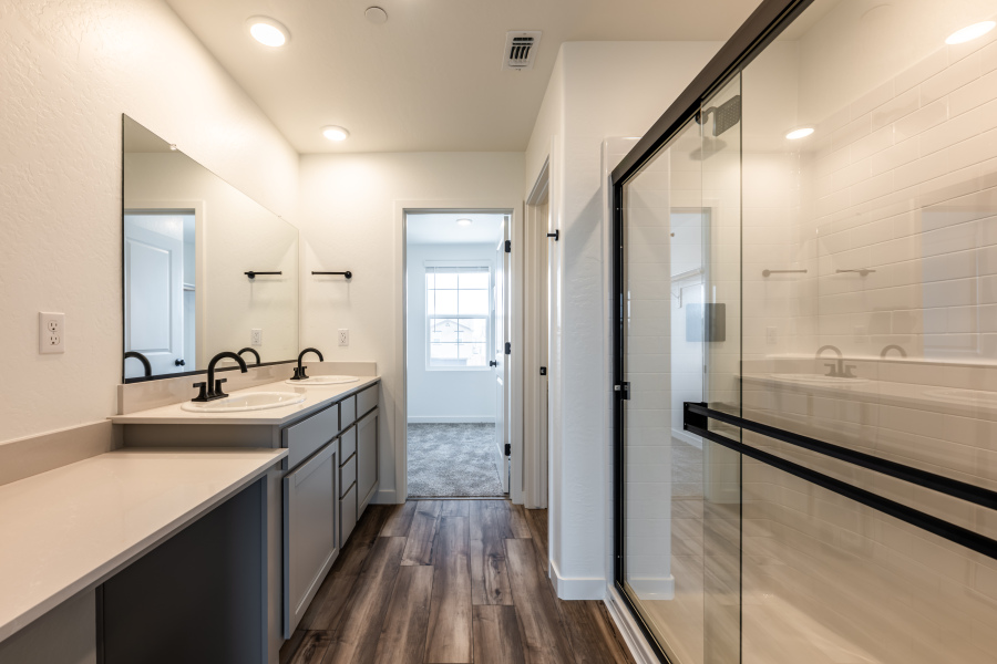 A bathroom with a glass shower.