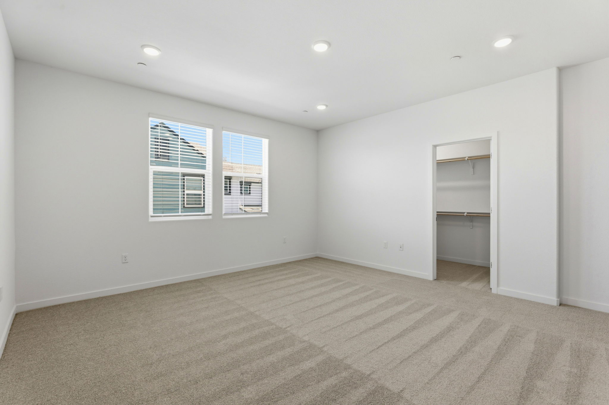 A room with a door and a window.