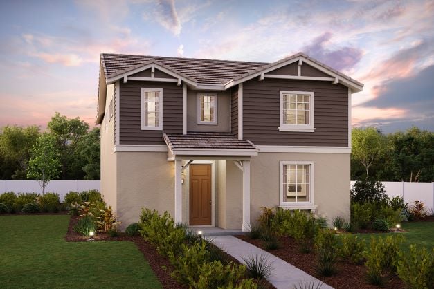 A house with a yard and a fence.