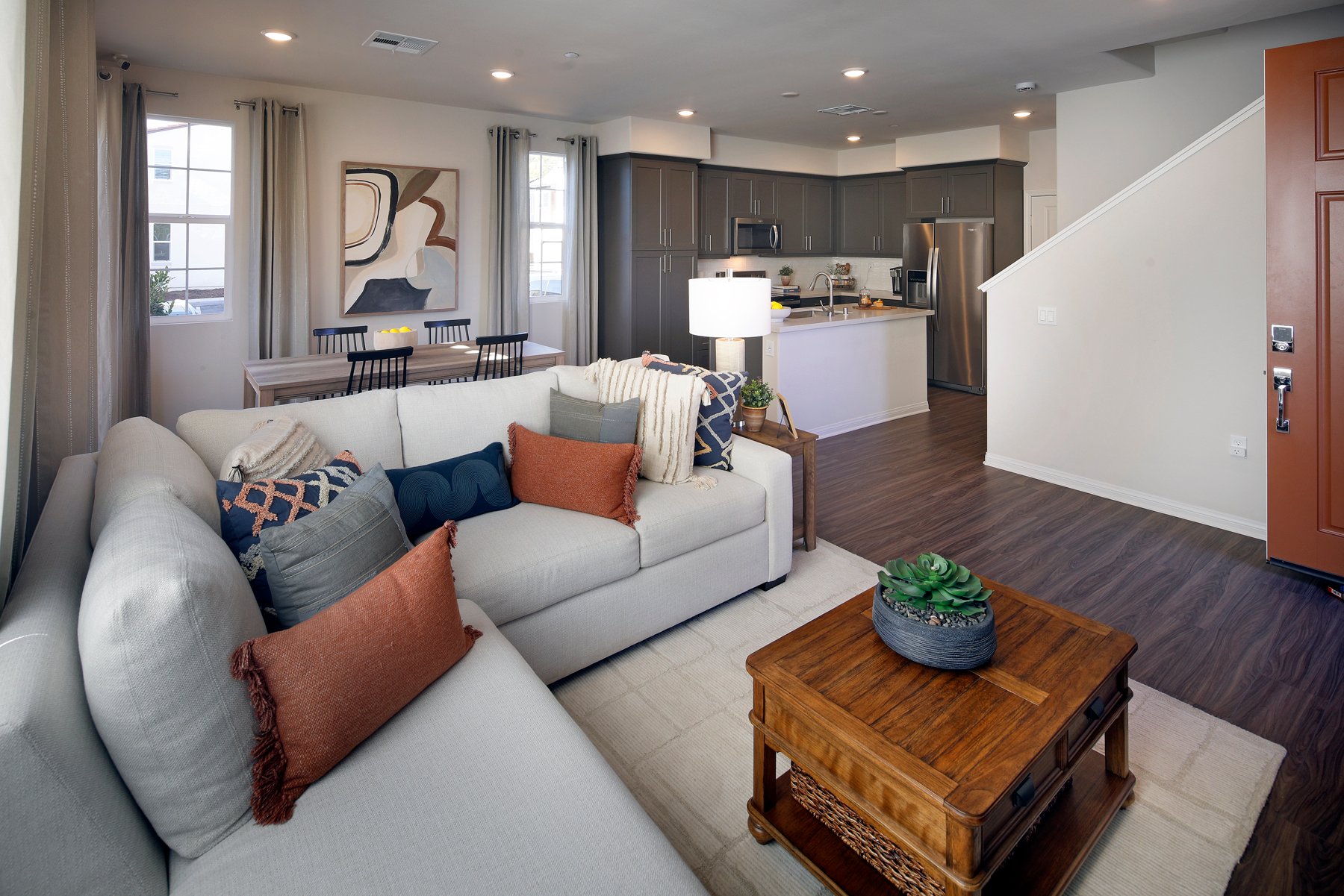 A living room with a couch and coffee table.
