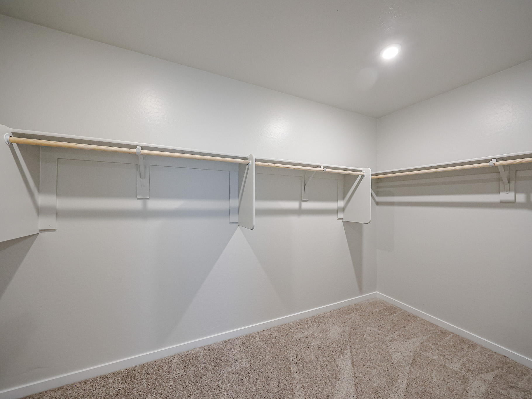 A white bathtub in a room.