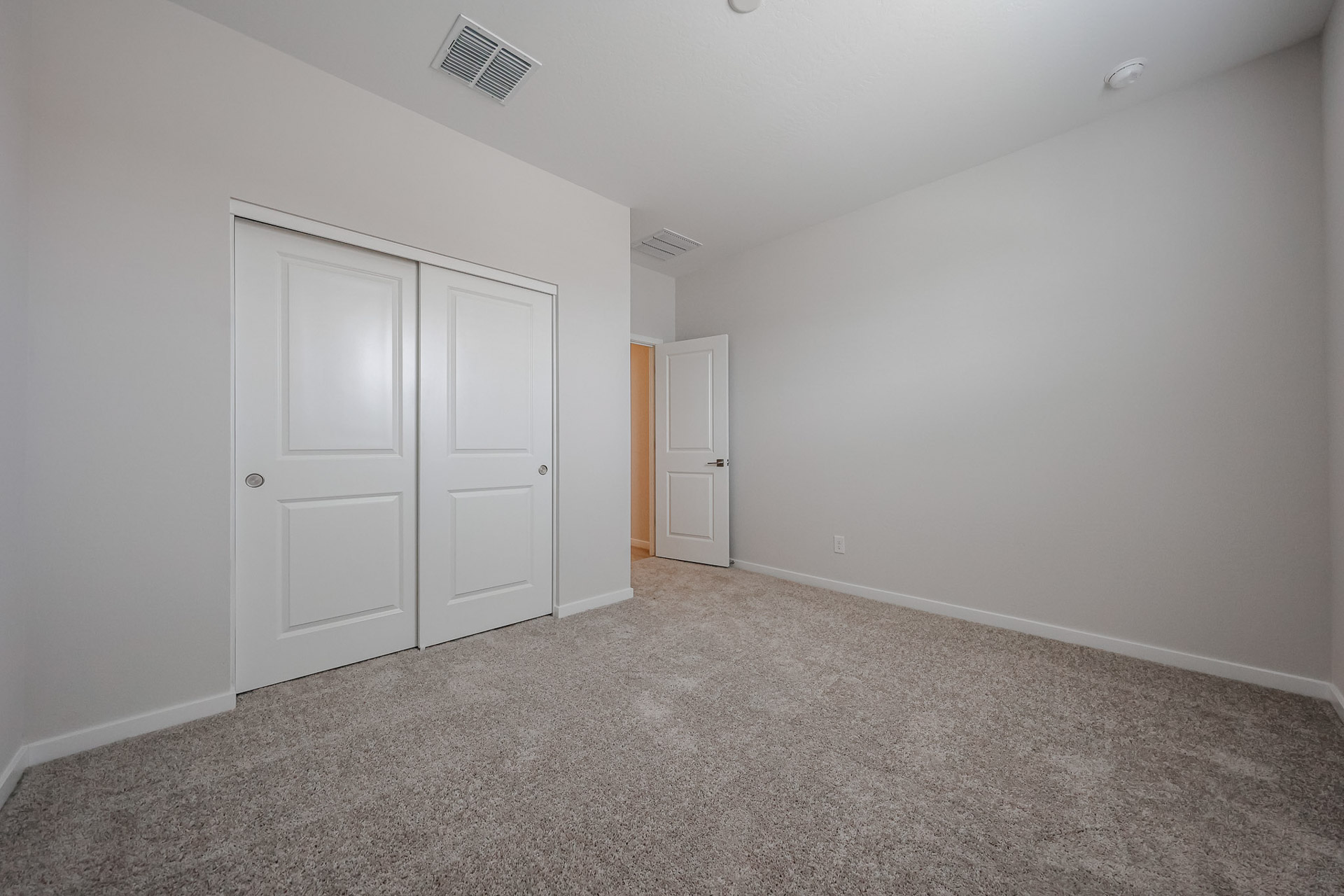 A room with white doors.