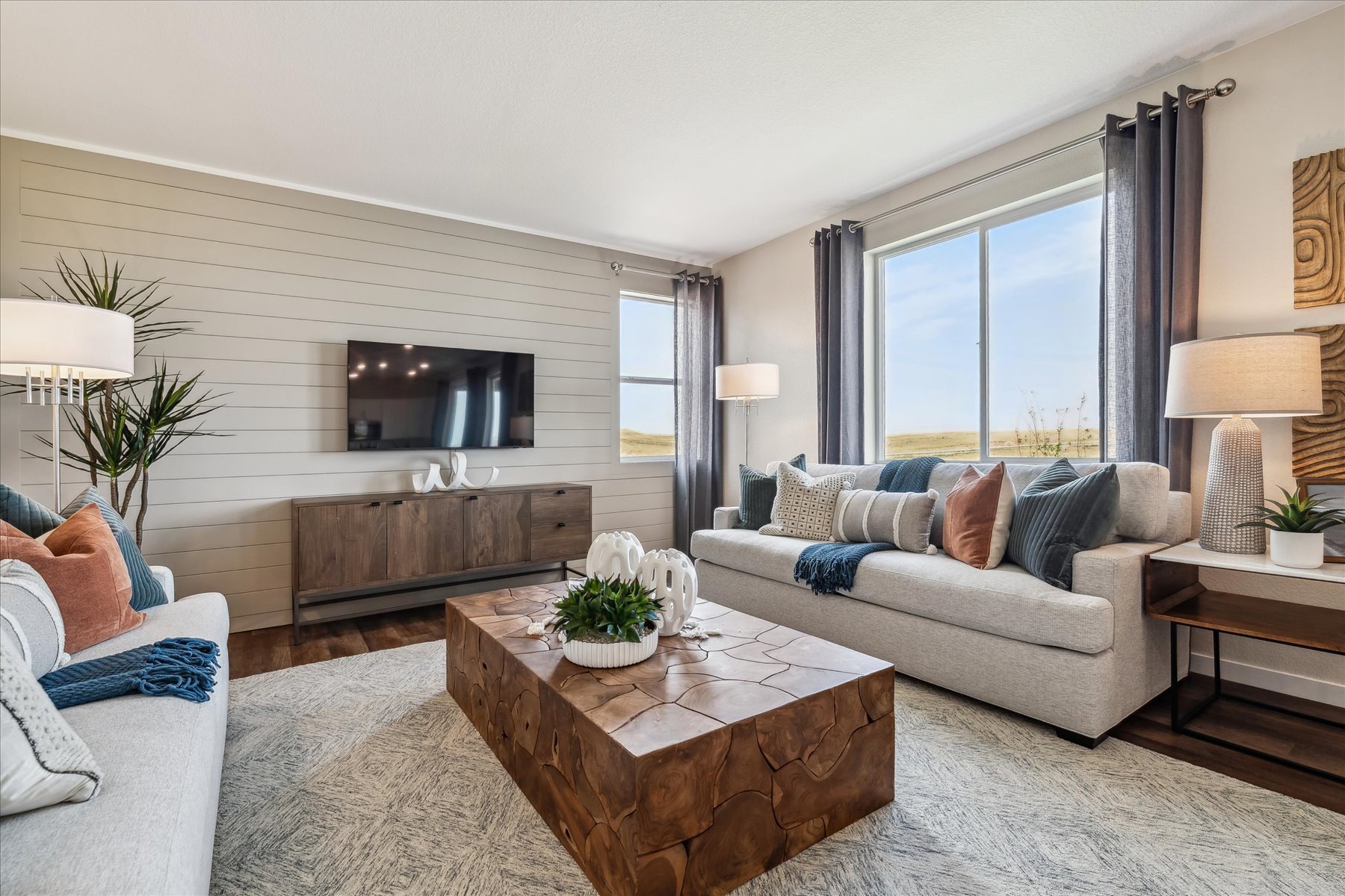 A living room with a couch and a coffee table.