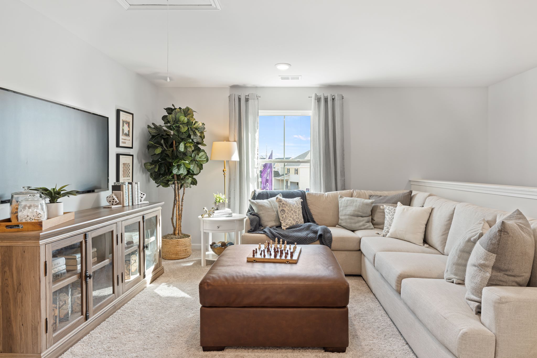 A living room with a couch and a coffee table.