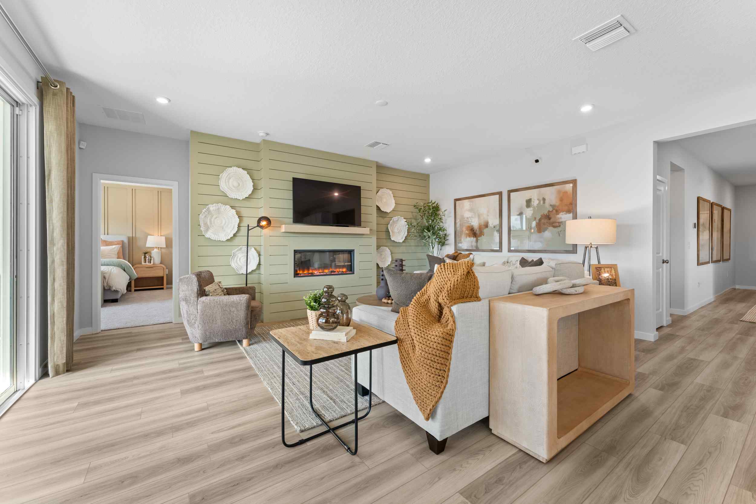 A living room with a fireplace.