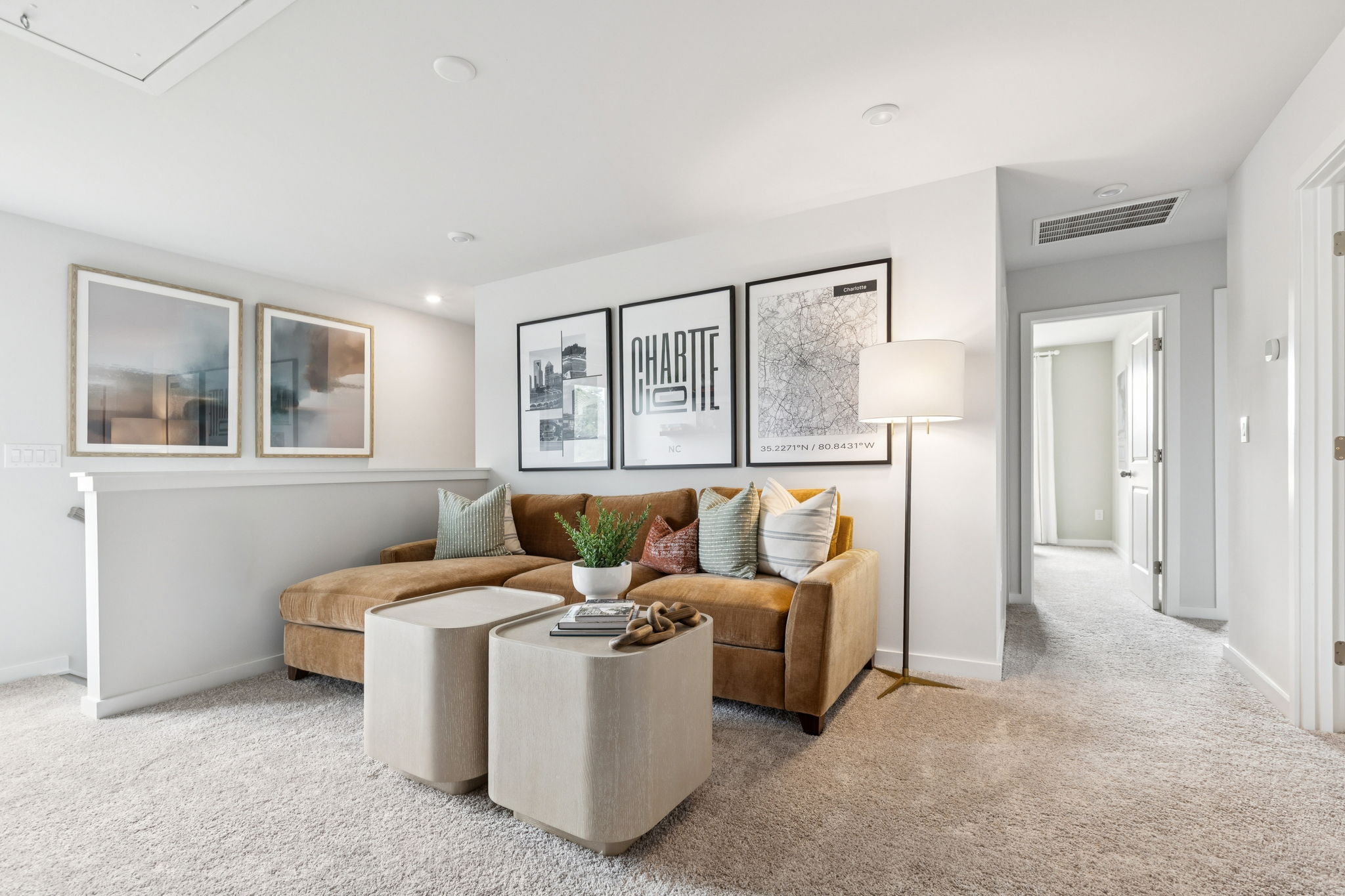 A living room with a couch and coffee table.