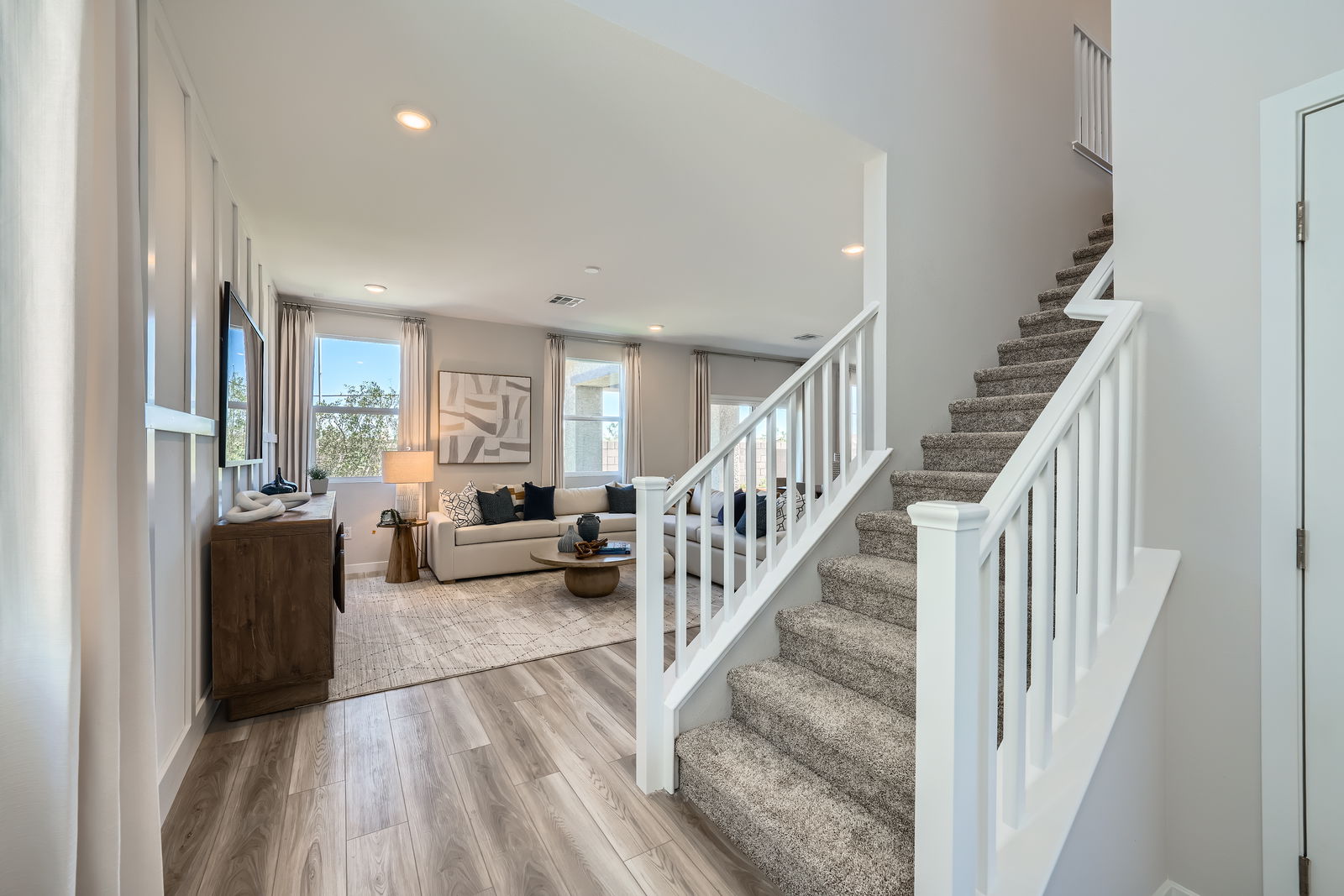 A large white staircase in a house.