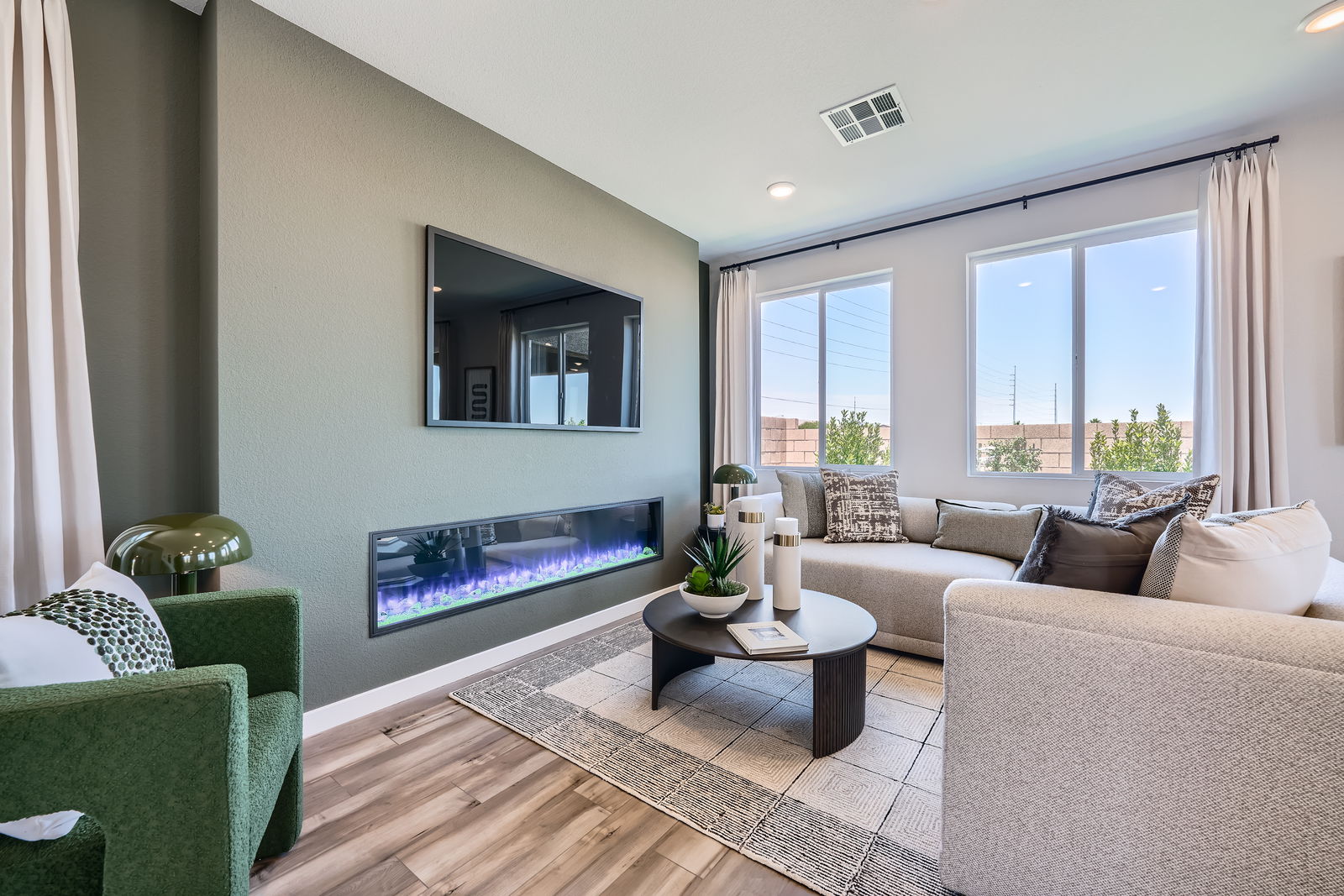 A living room with a fireplace.
