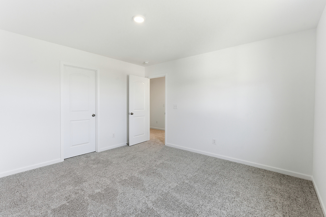 A room with white doors.