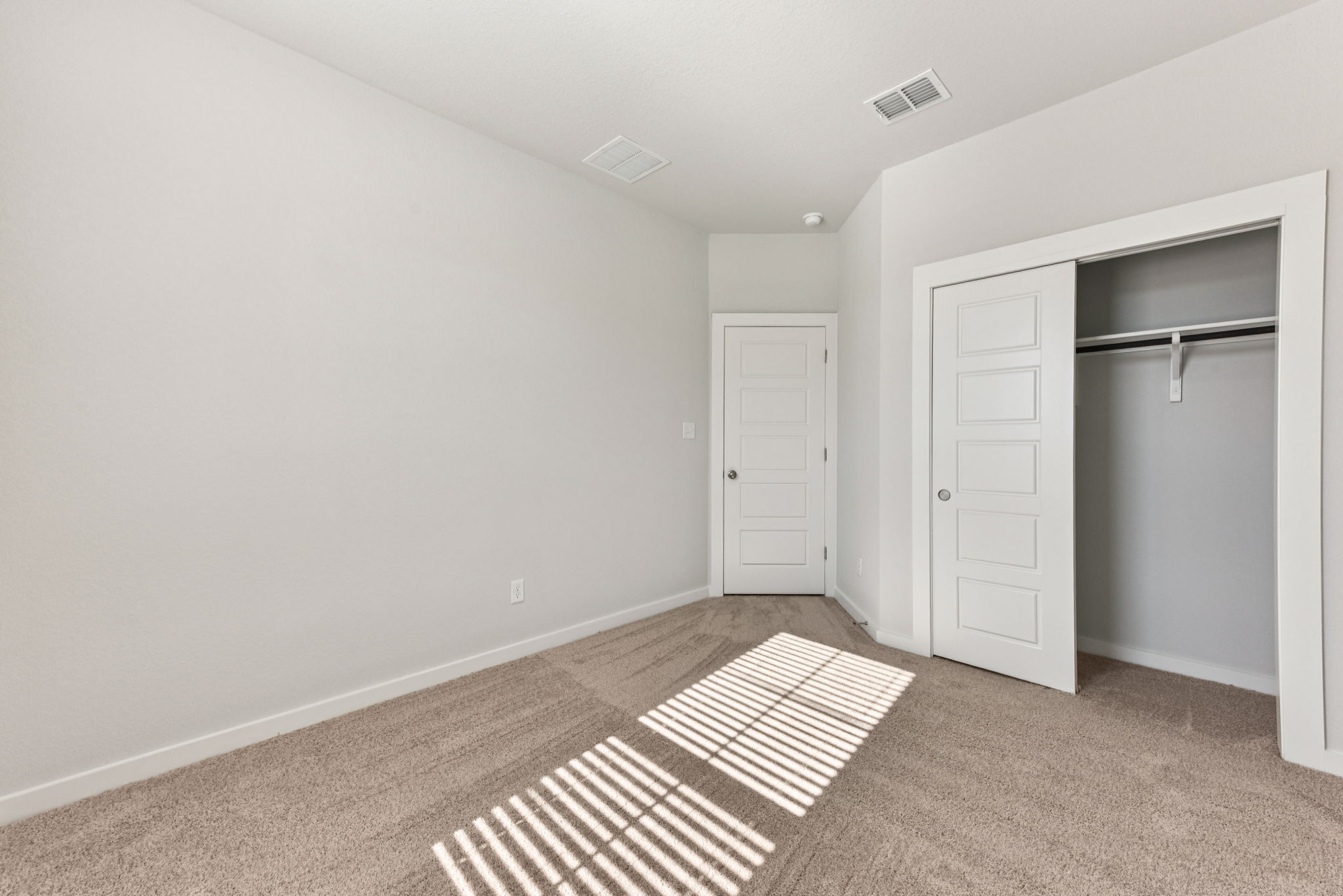 A room with white doors.