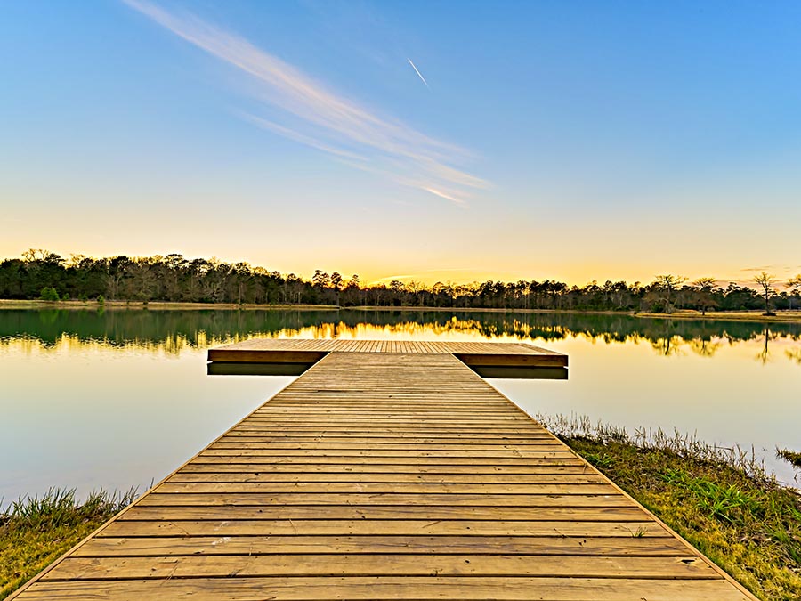 A wooden dock over a body of water.