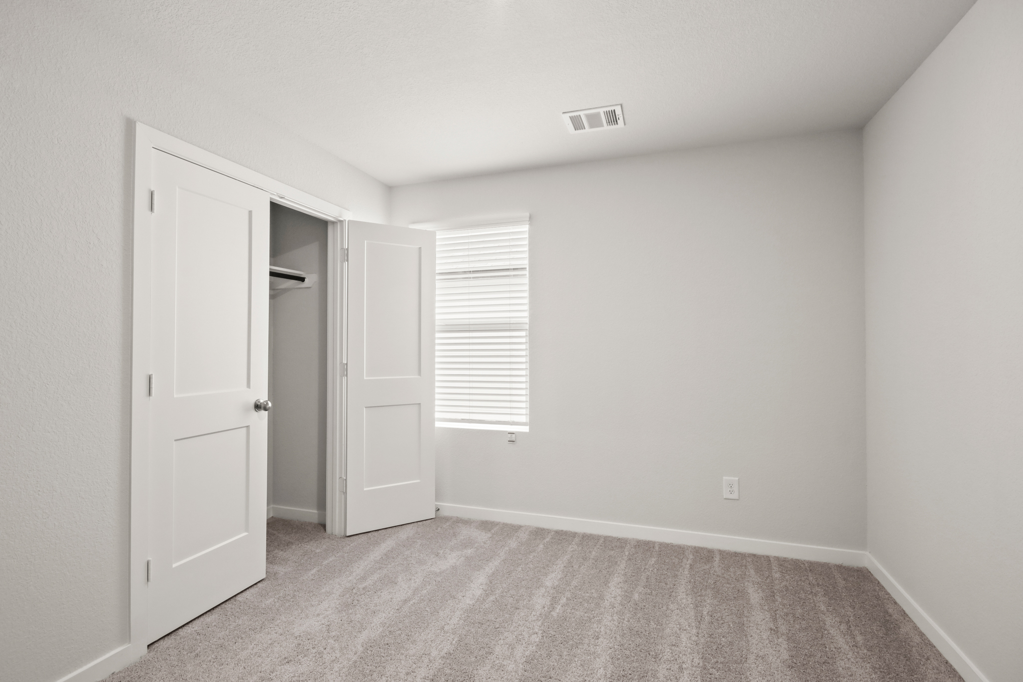 A room with white doors.