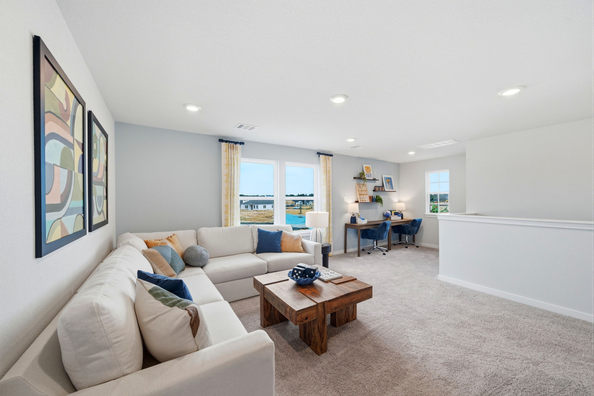 A living room with a large window.