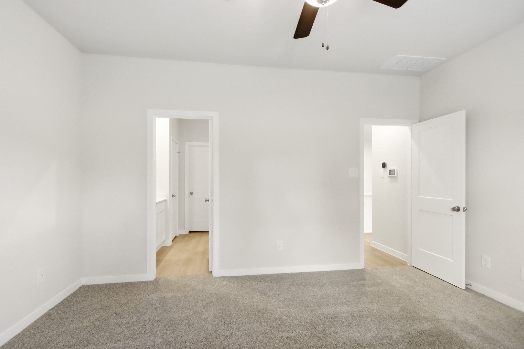 A room with white doors.