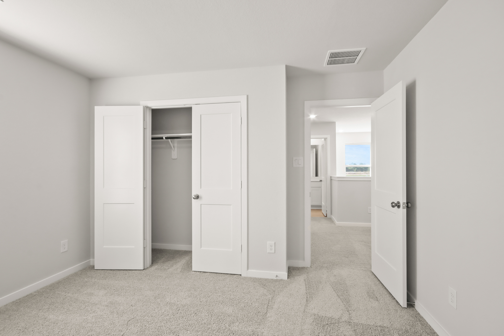 A room with white doors.