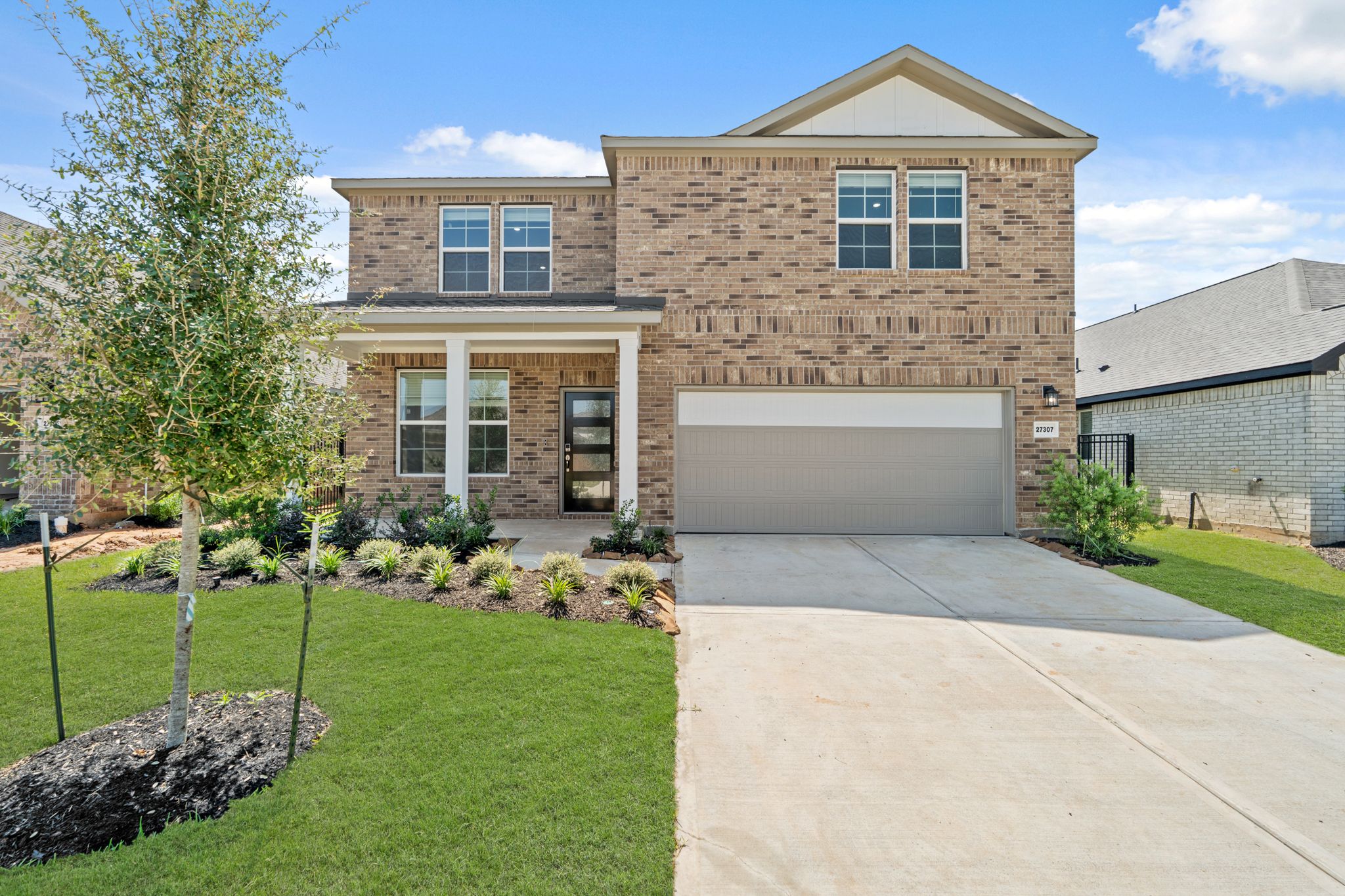 A house with a driveway.
