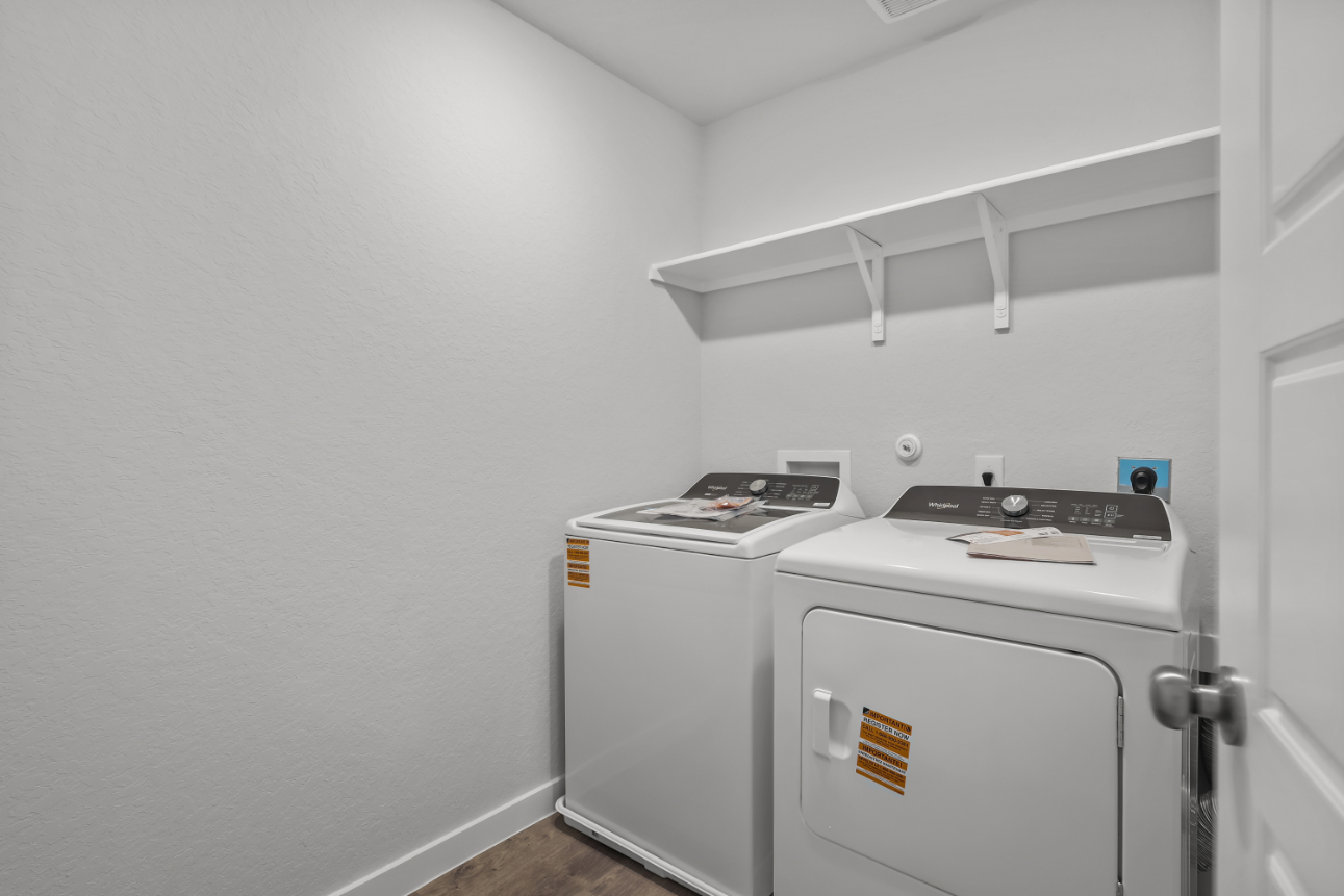 A white room with a white wall and a white machine.