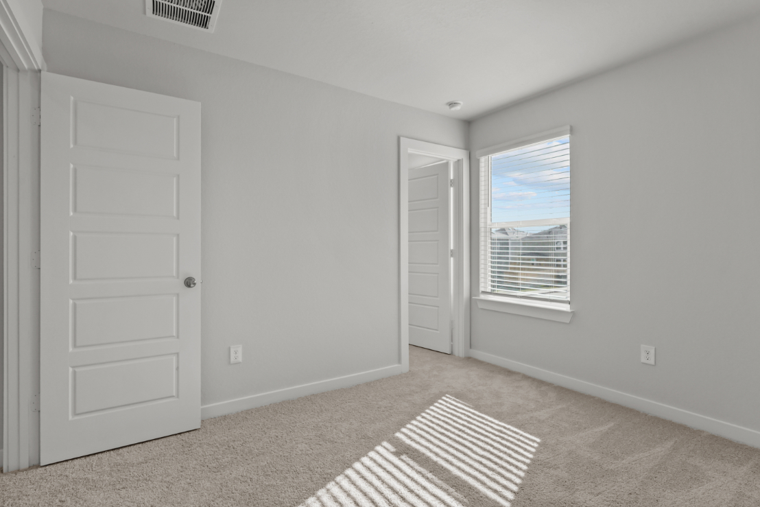 A room with white doors.