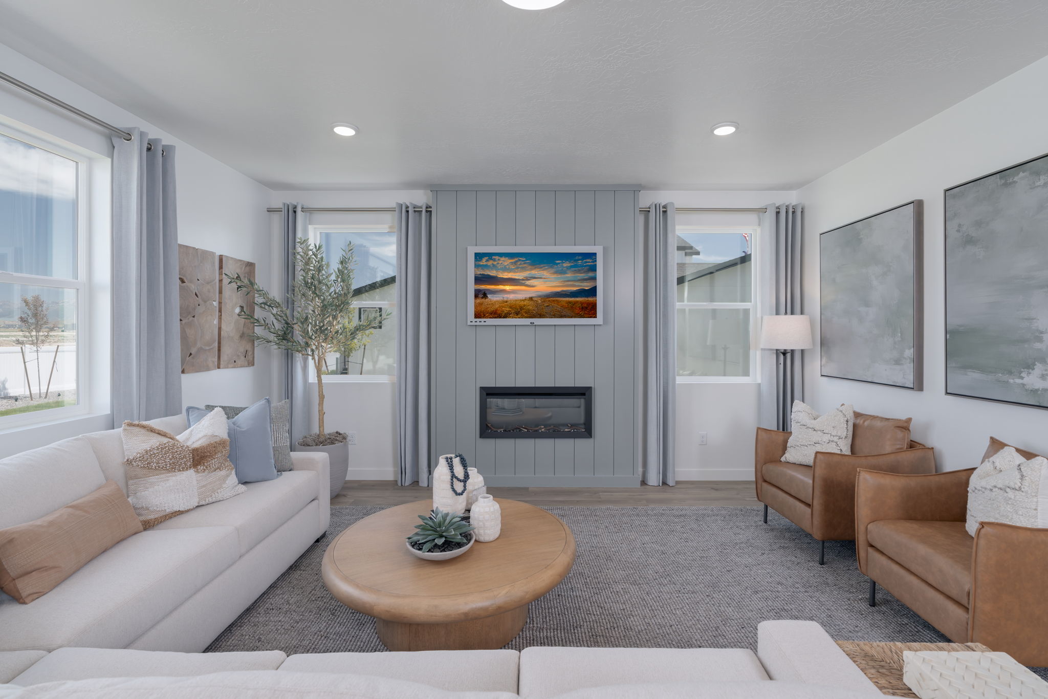 A living room with a large window.