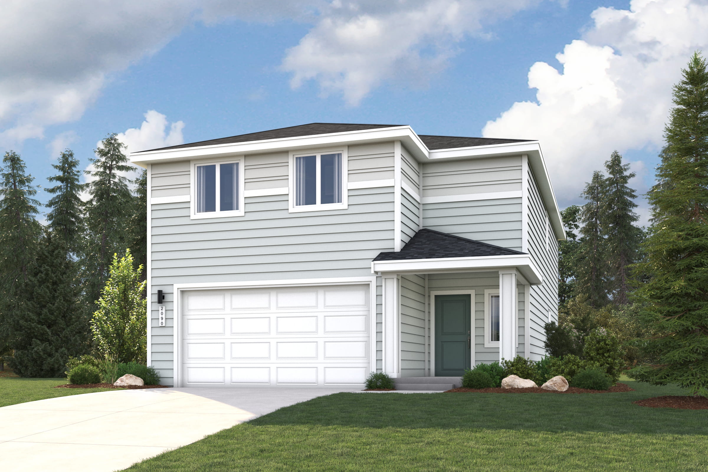 A white house with a garage.