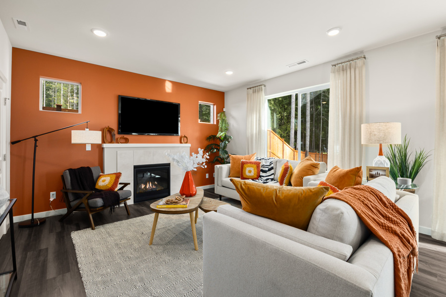 A living room with a fireplace.