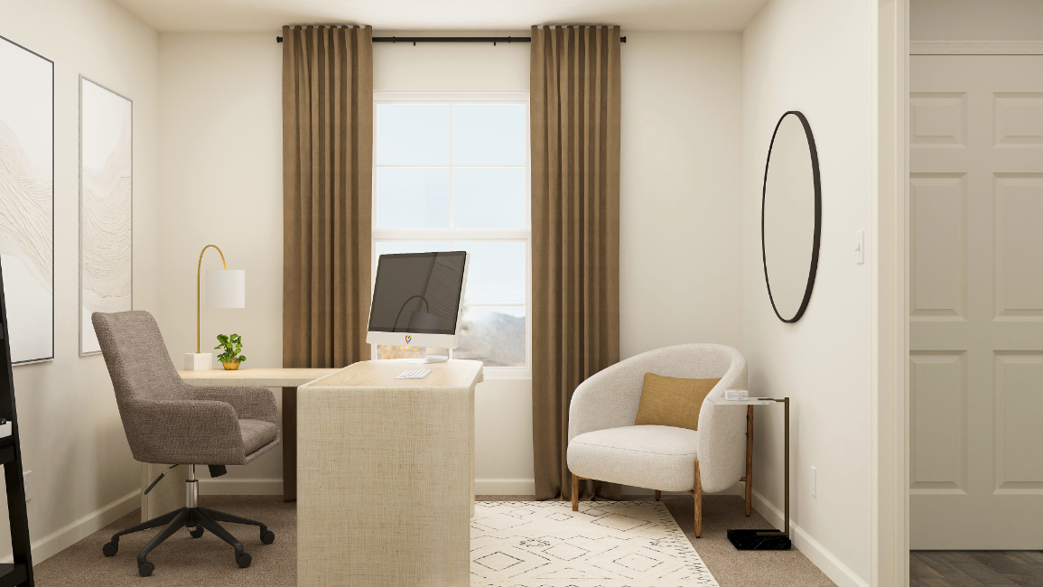 A room with a desk and chairs.