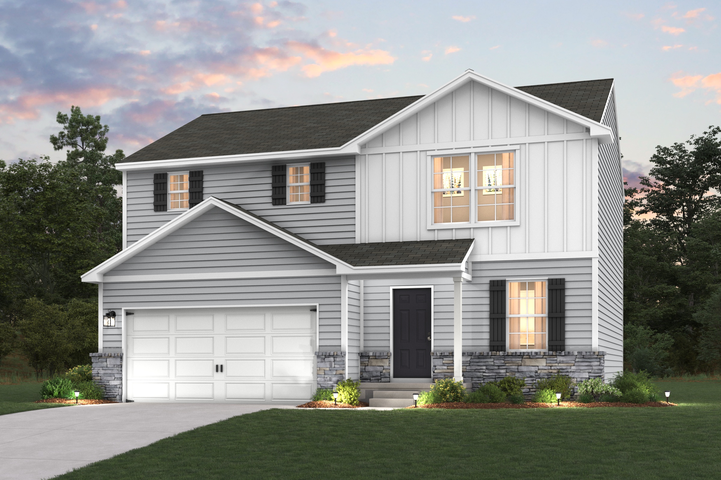 A white house with a garage.