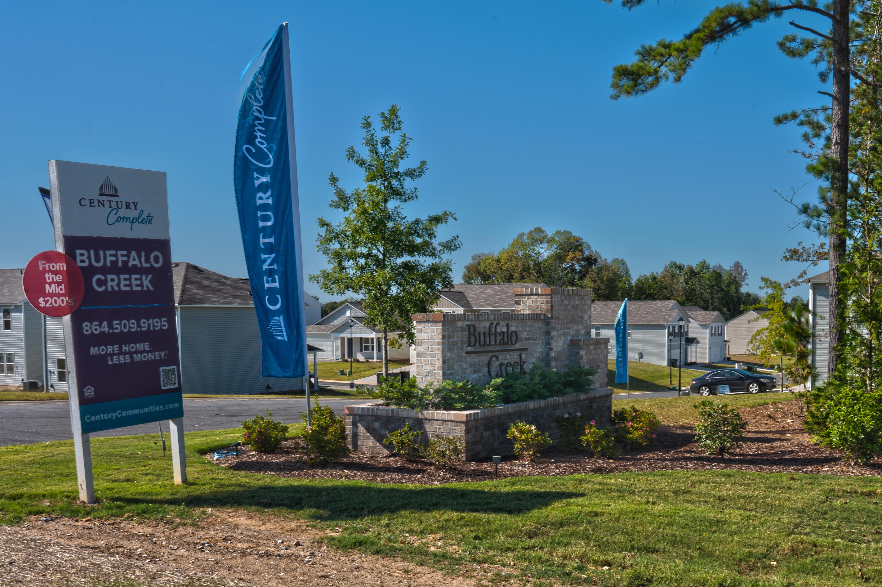 A sign in front of a building.