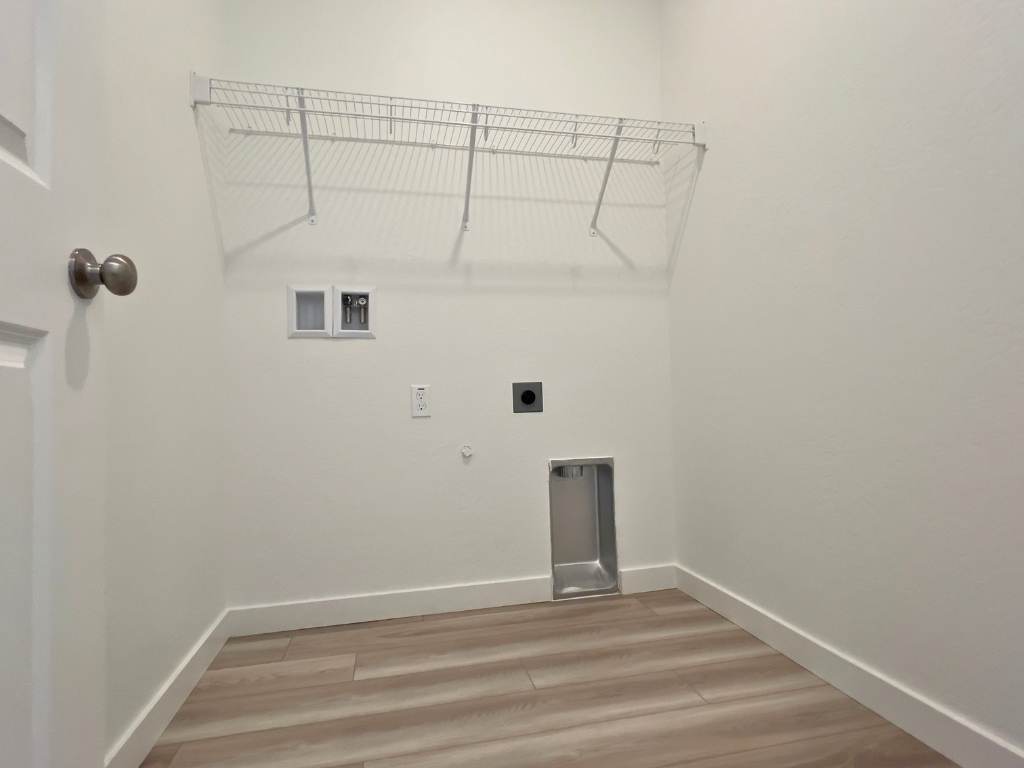 A room with a metal railing.